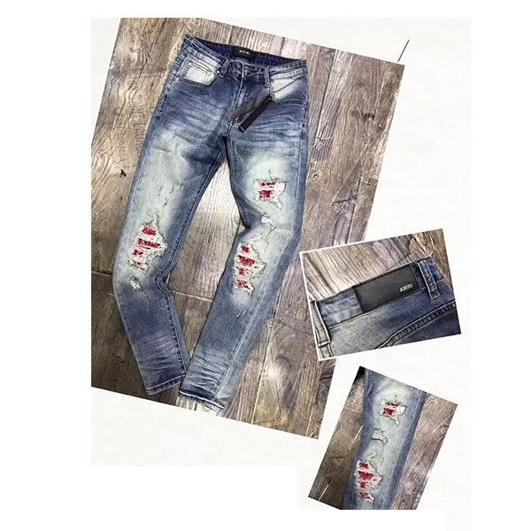 Amiri Ripped with Red Batch Straight cut Jeans