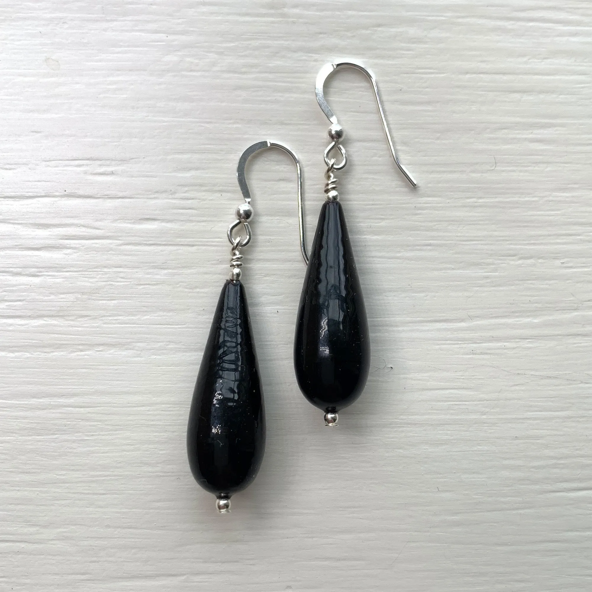 Earrings with black pastel Murano glass long pear drops on silver or gold hooks