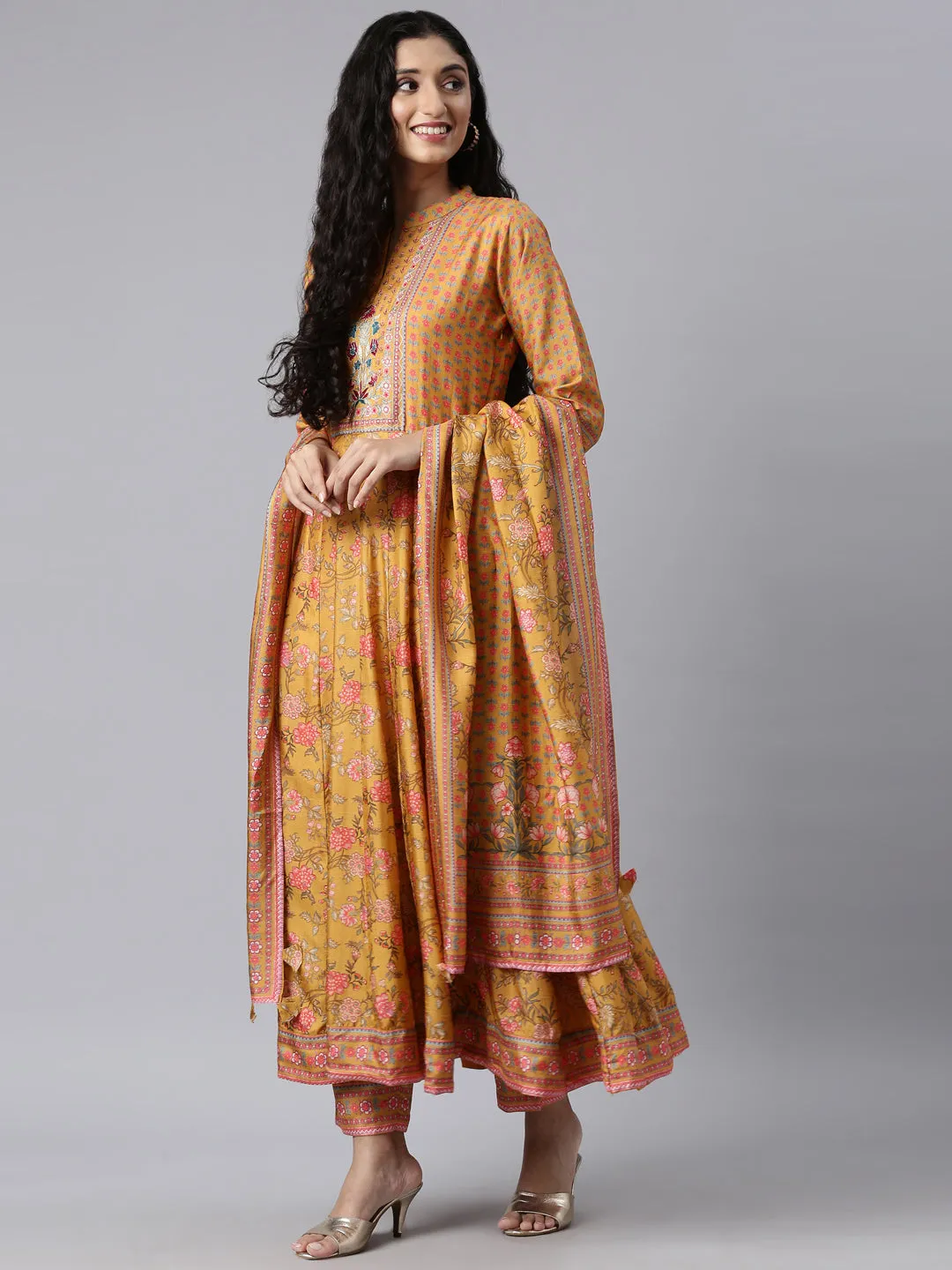 Neerus Mustard Regular Anarkali Kurta and Trousers With Dupatta